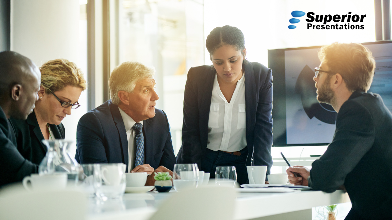 Manager engaging confidently with a team during a leadership training session